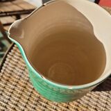 Green glazed ceramic pitcher