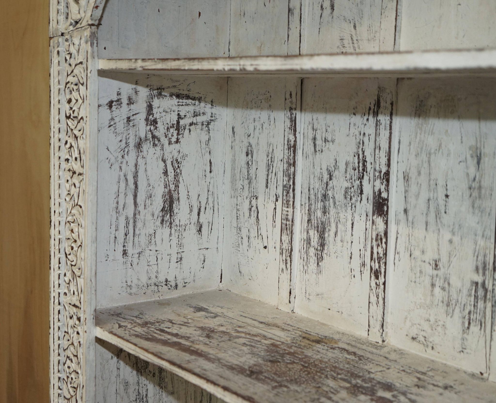 Large antique Anglo-Indian library in carved solid wood with original paint.