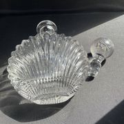 Perfume or strong alcohol bottle