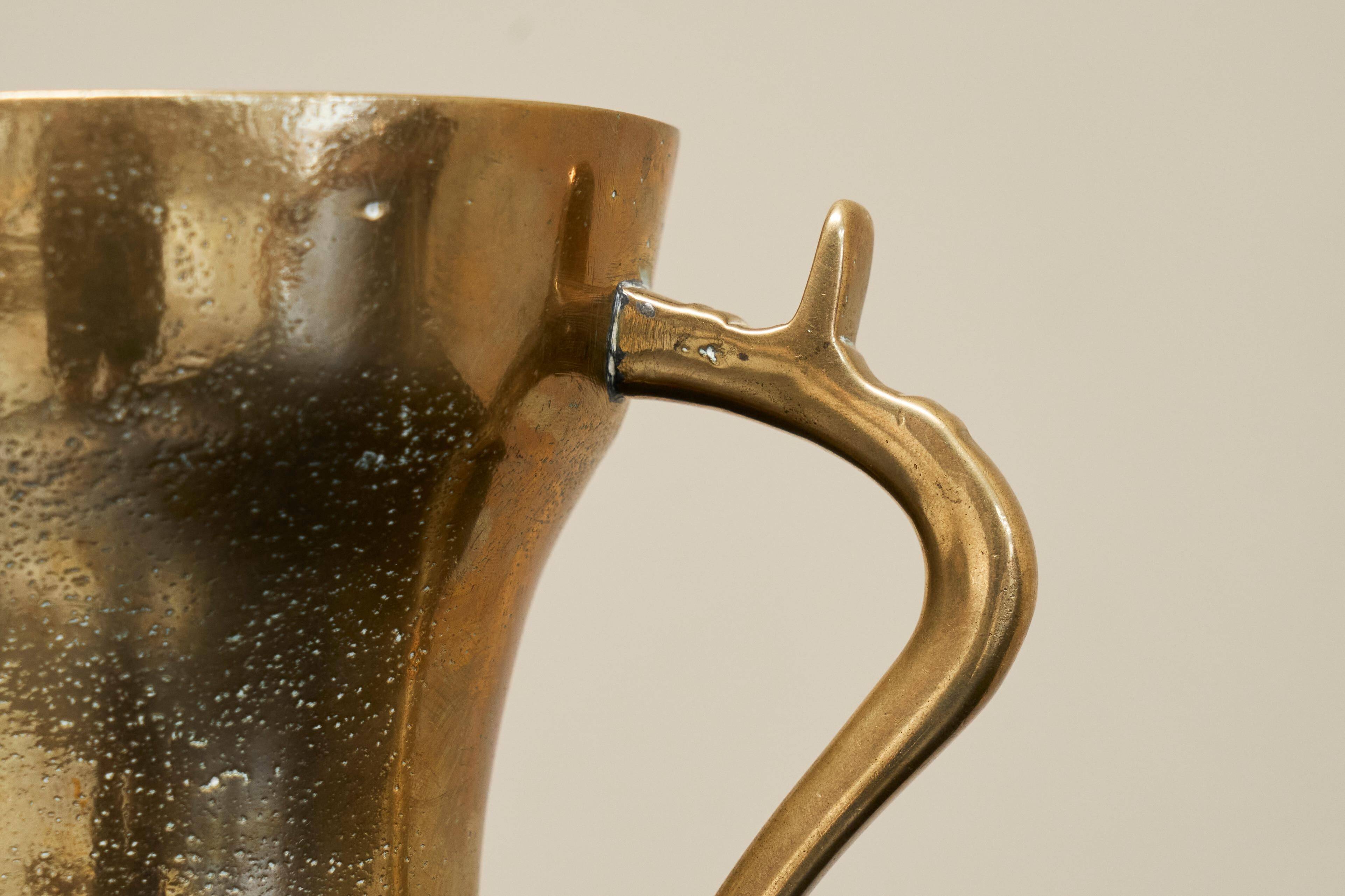 Antique brass jug, 19th century.