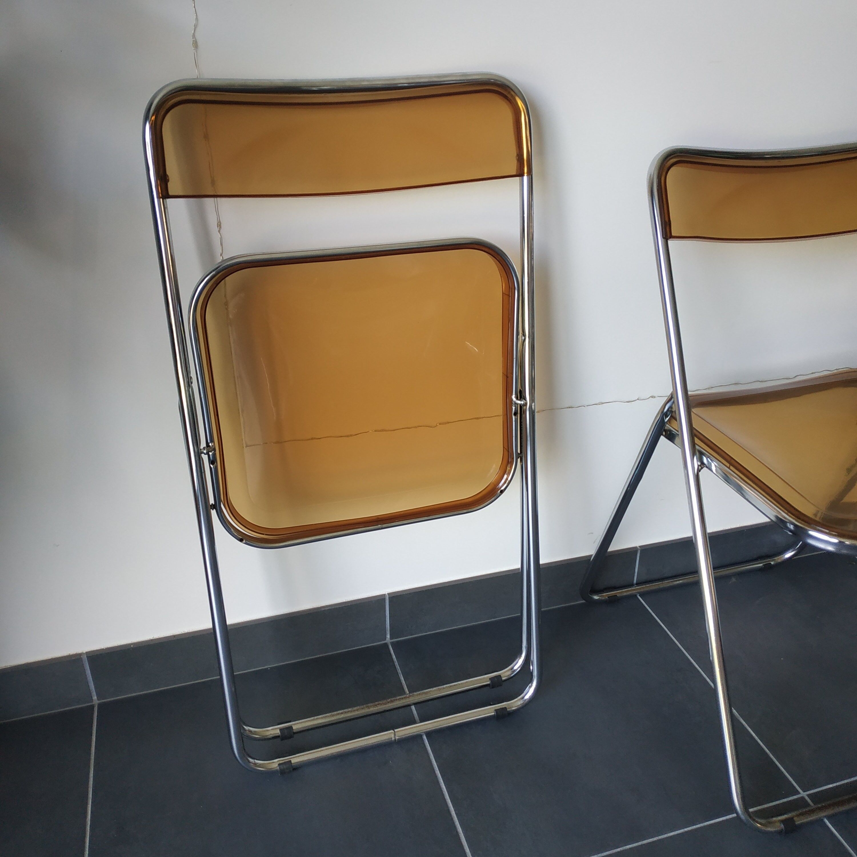 Seventies stainless steel and caramel chairs