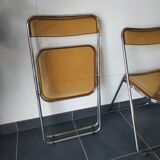 Seventies stainless steel and caramel chairs