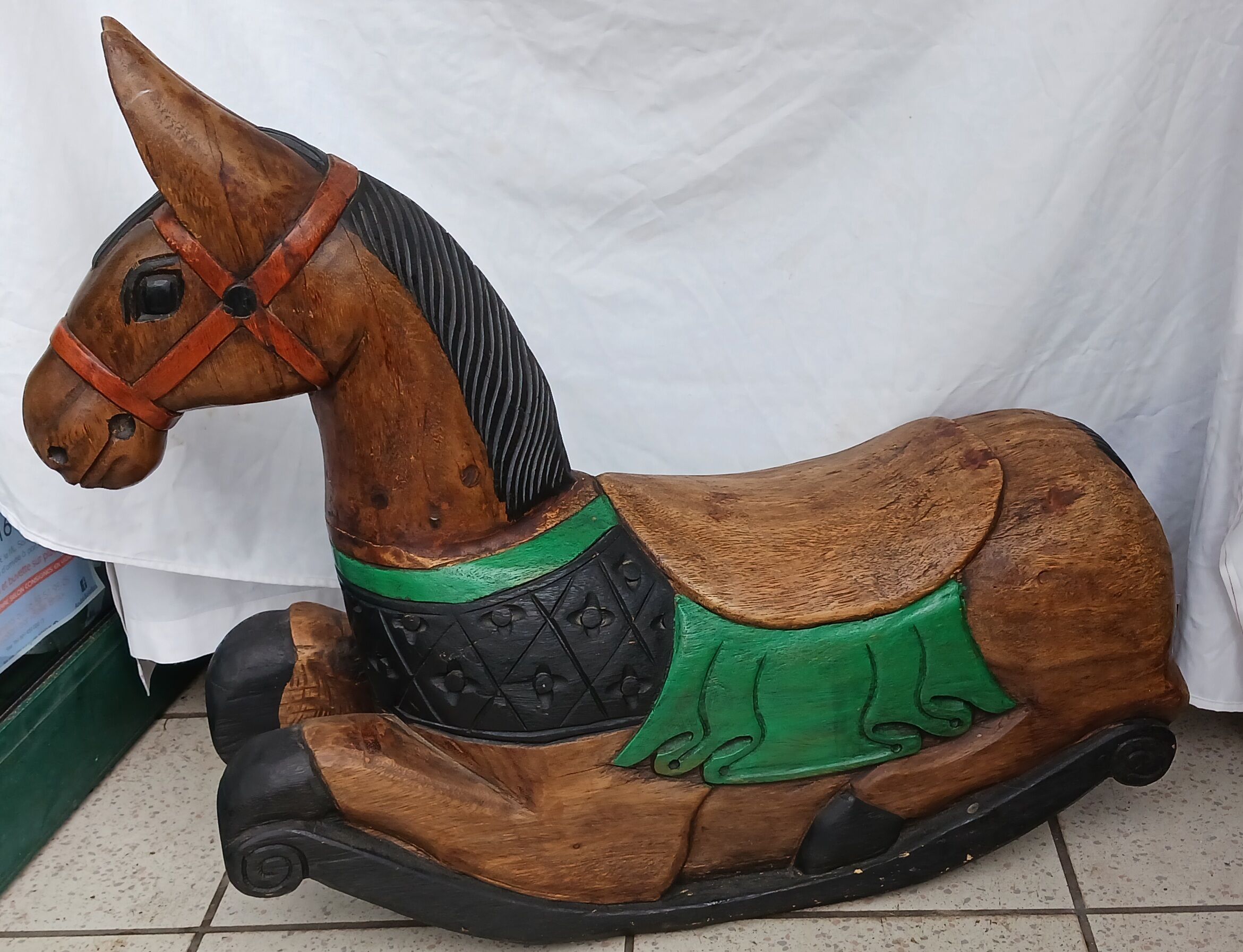 Carved wooden rocking horse, hand painted