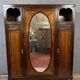 Louis Majorelle: Art Nouveau period mirrored wardrobe in Macassar and Walnut