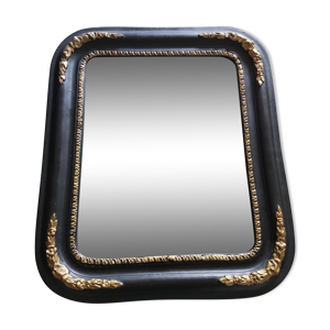 Miroir ancien en bois noir et doré