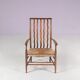 1930s small low spindle-back hearth chair / side chair with wicker seat, Arts & Craft Movement, Morris & Co for Liberty and Co, Stowaway London