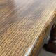 English monastery table with extensions from the late 19th century in elm and oak.