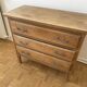 Natural wood chest of drawers