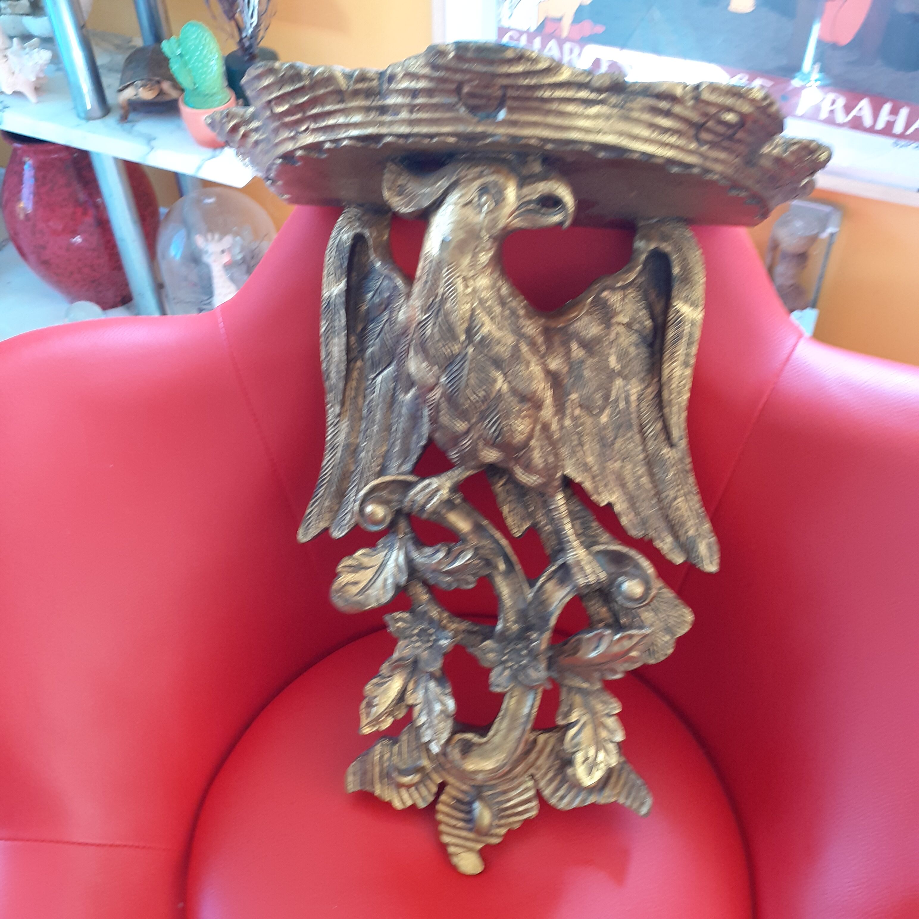 Golden wall shelf, eagle motif