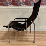 Black leather reclining lounge chair, "Hans Eichenberger" design, 1960.