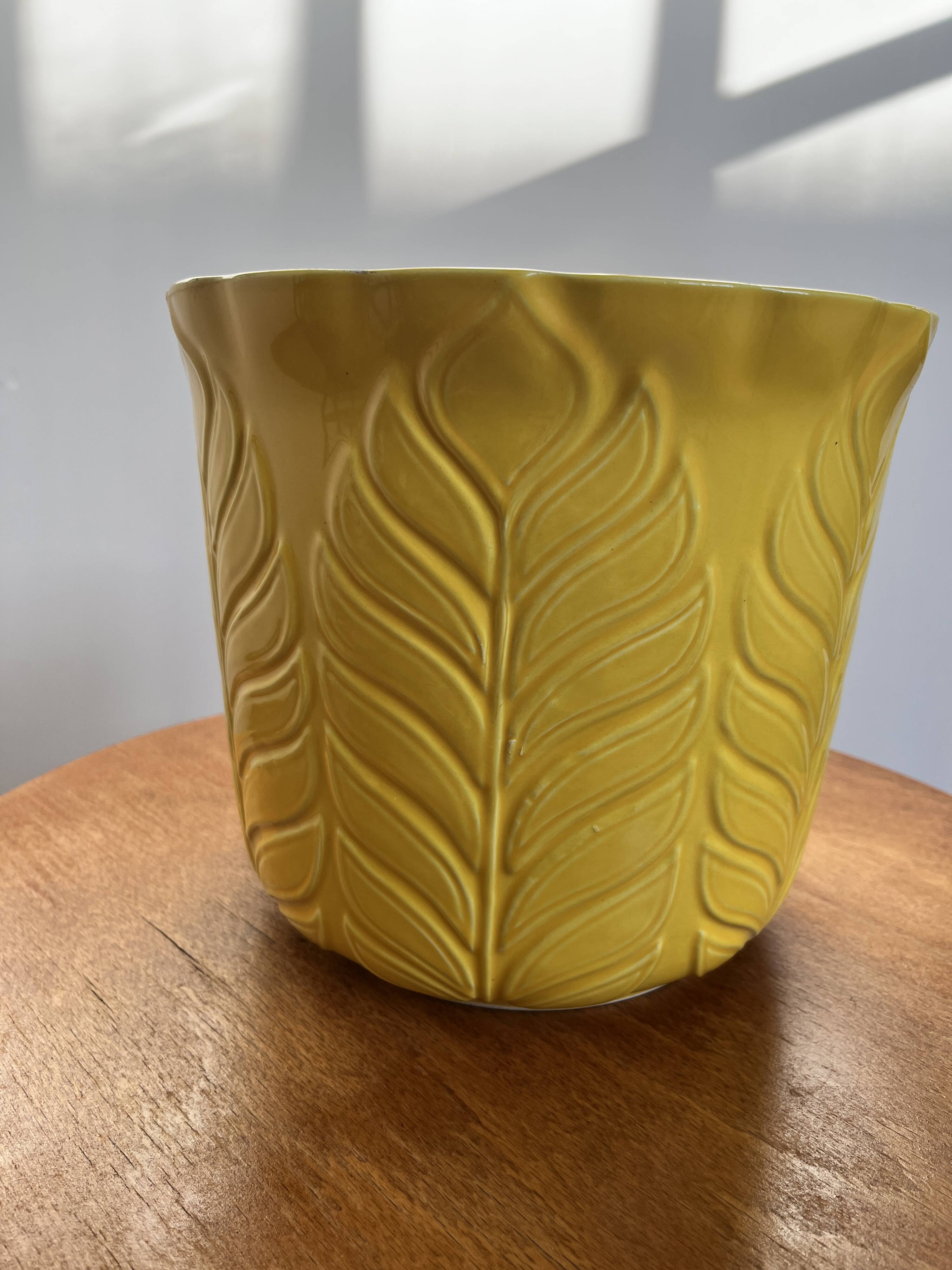 Yellow ceramic plant pot