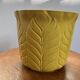 Yellow ceramic plant pot