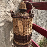 Glass and wicker cylinder