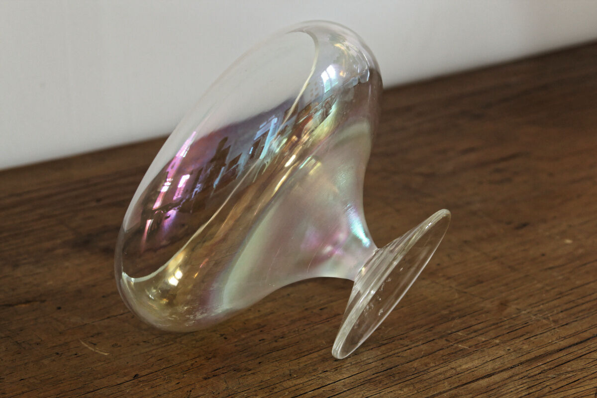 Old iridescent glass cup