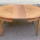 Round extendable dining table stripped in cherry wood with Louis XVI marquetry 1