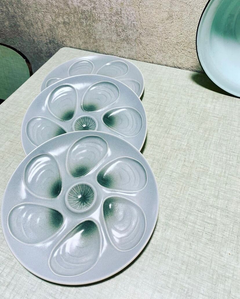 Salins factory oyster plates in water green colors