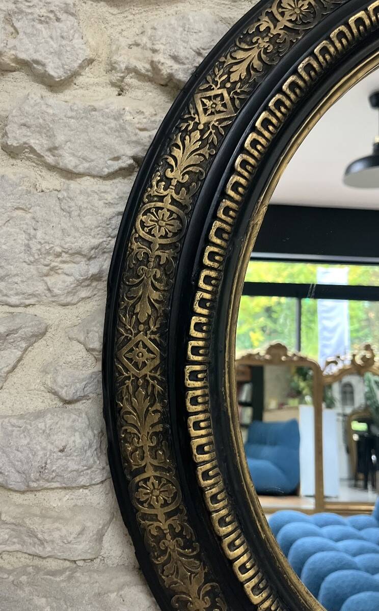 Miroir ancien 61,5/53,5cm ovale époque Napoléon III, noir et doré