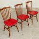 Lot de 3 chaises bois et skaï rougeTacoma par Baumann 1960