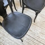 Set of 7 black bistro chairs