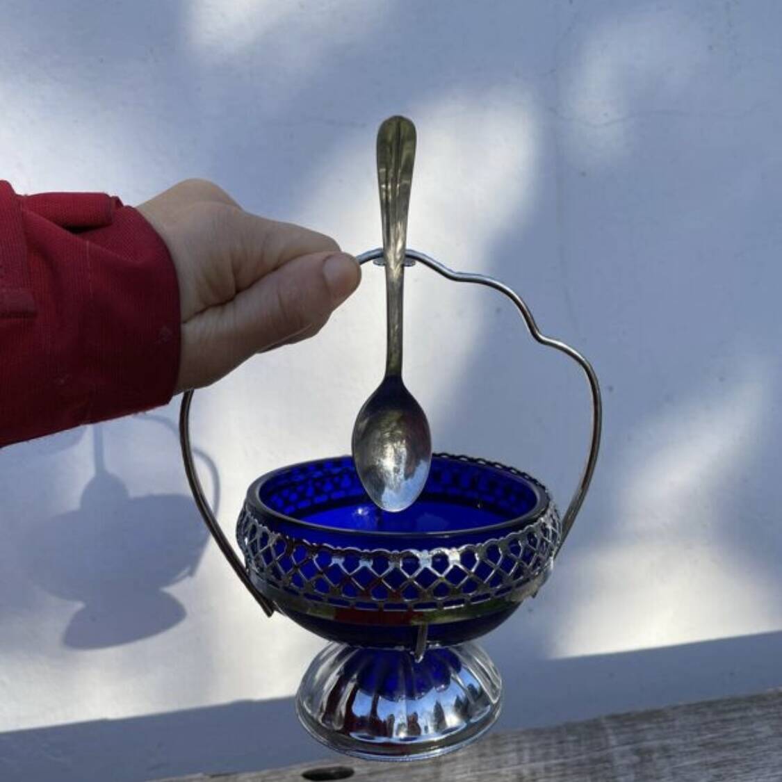 Silver-plated metal and blue glass sugar and salt shaker