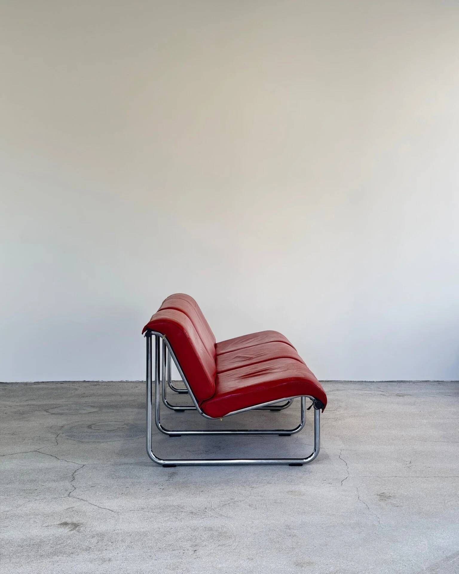 Red leather Remmi sofa by Yrjö Kukkapuro