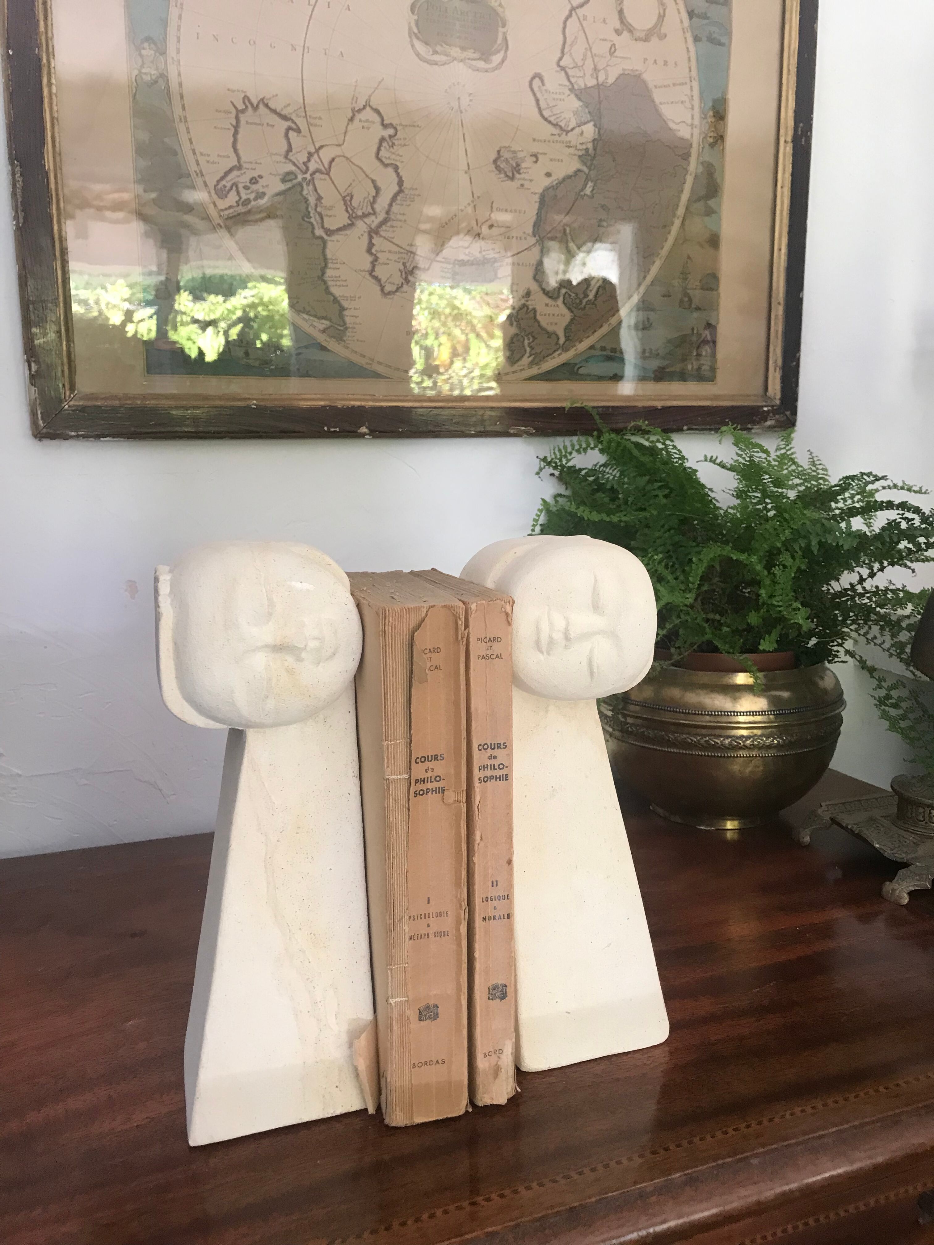 Pair of stone book clamts