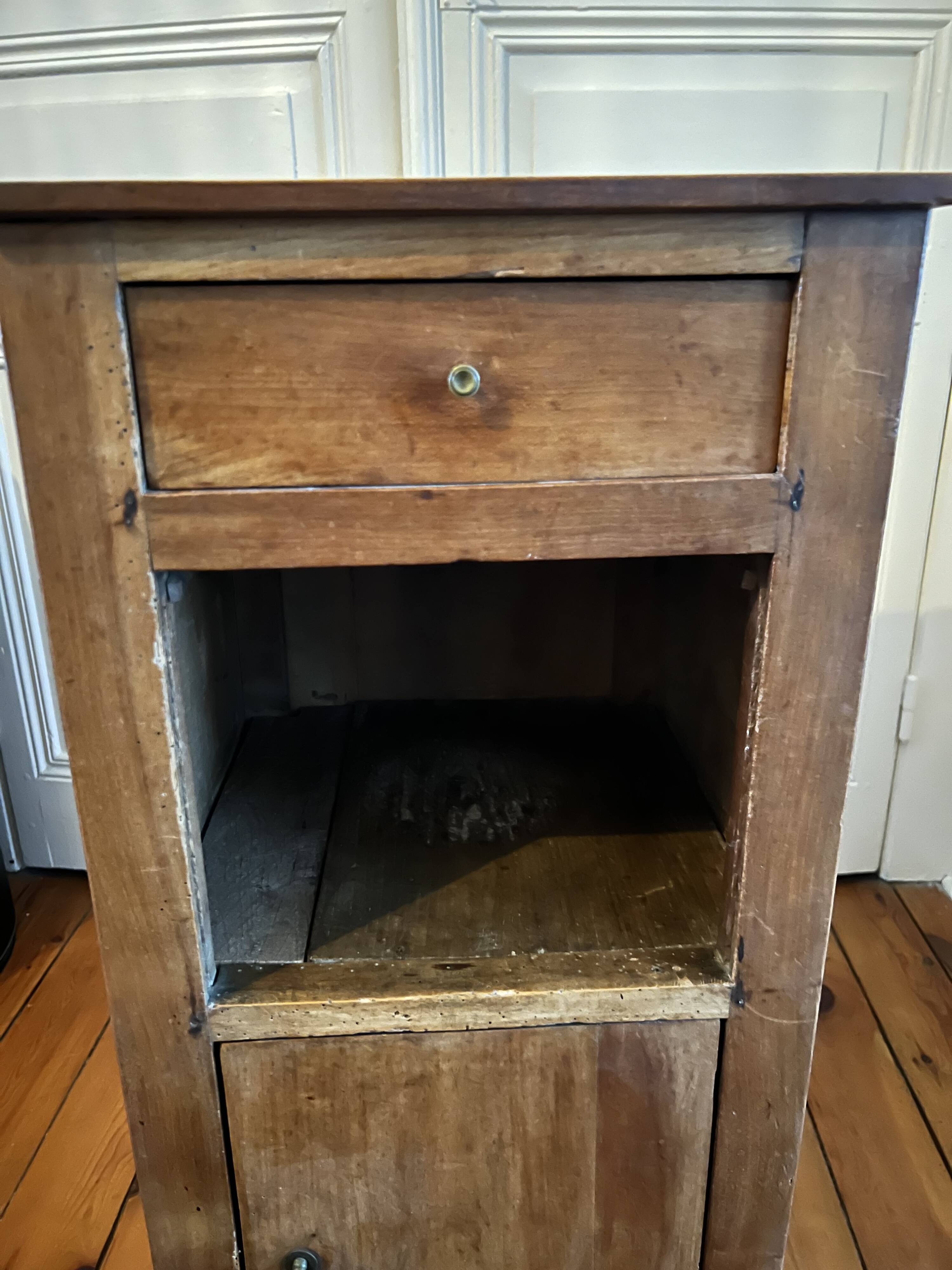 Old wooden bedside table