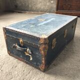 Large blue travel trunk