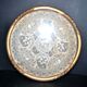 Antique lace top under glass and gilded stucco frame