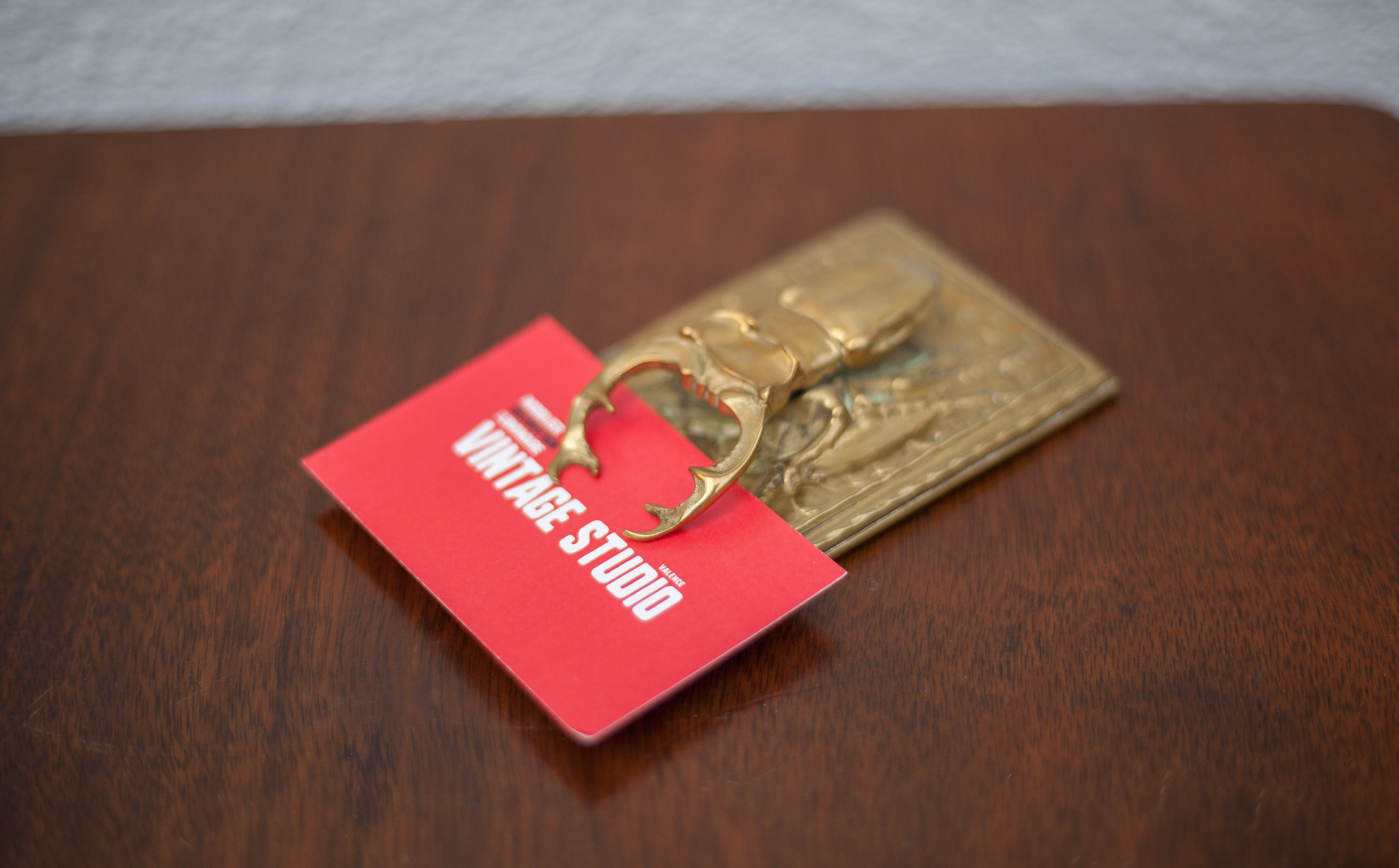 Scarab brass mail clip