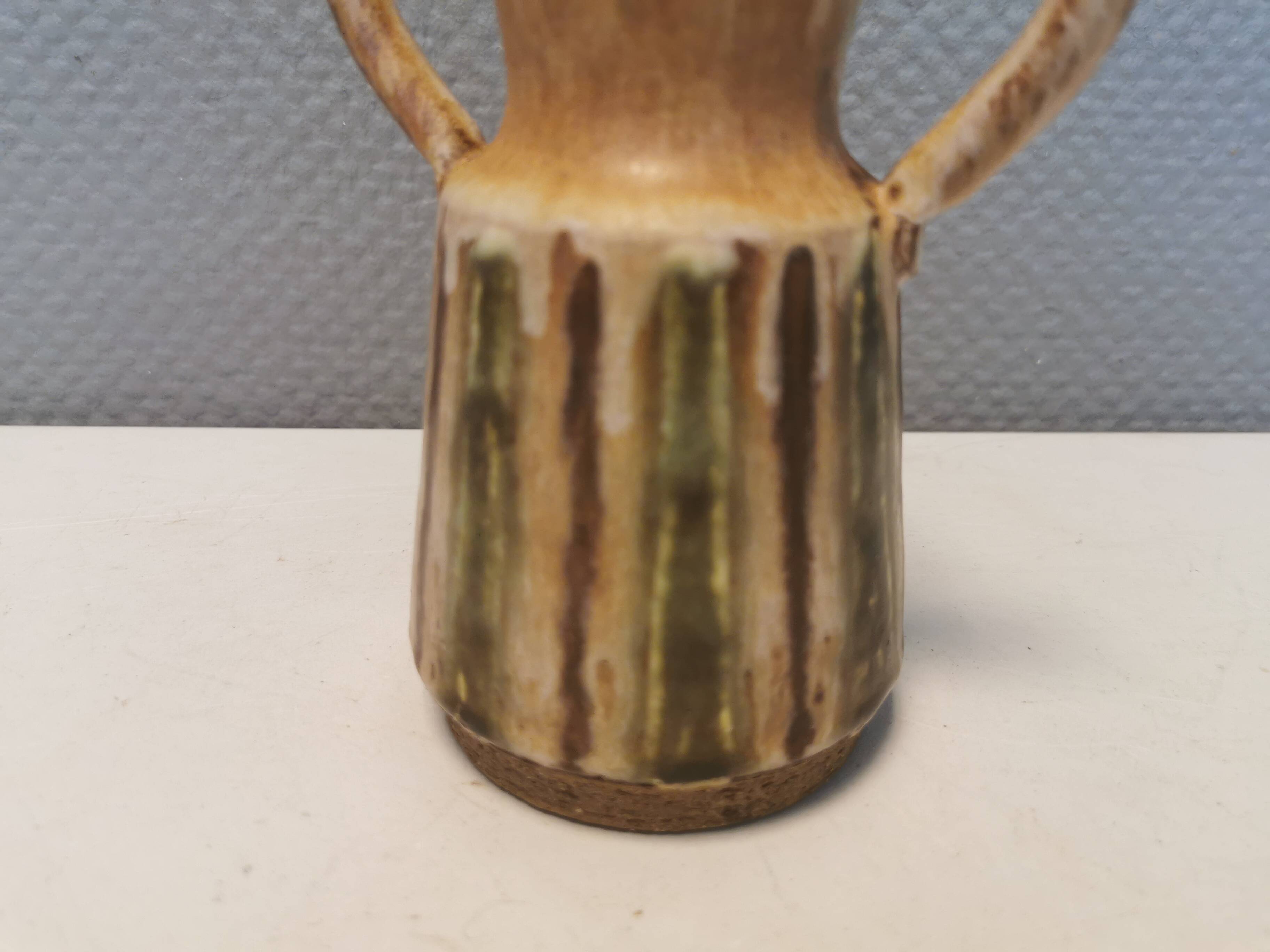 Beautiful ceramic vase in the shape of a lady, in multicolored glaze. Denmark 1970-80s