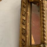 Miroir à pare-closes en bois et stuc doré Napoléon III XIX siècle