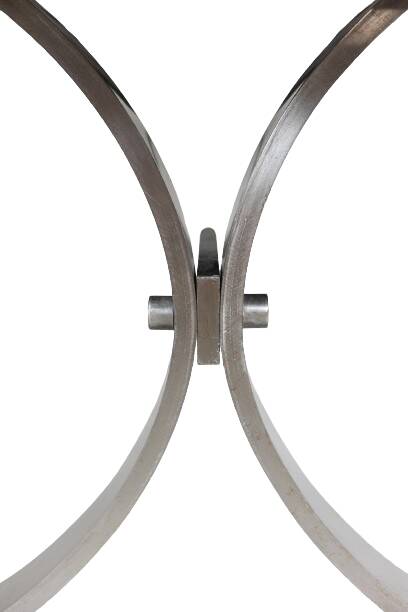 Polished metal and ceramic dining table. 1970s.