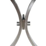 Polished metal and ceramic dining table. 1970s.