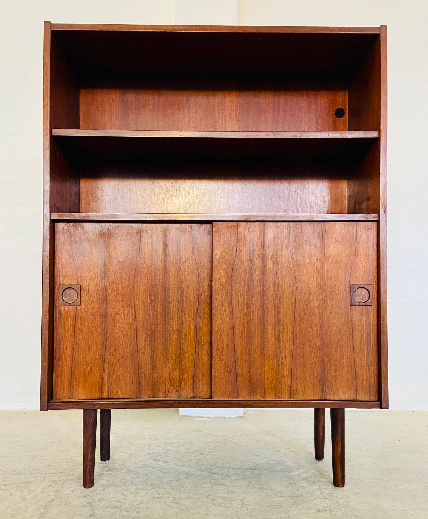 Danish retro vintage library in rosewood with sliding doors from the 1960s.