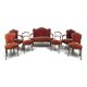Louis XV style salon in carved walnut with orange velvet, seven pieces.