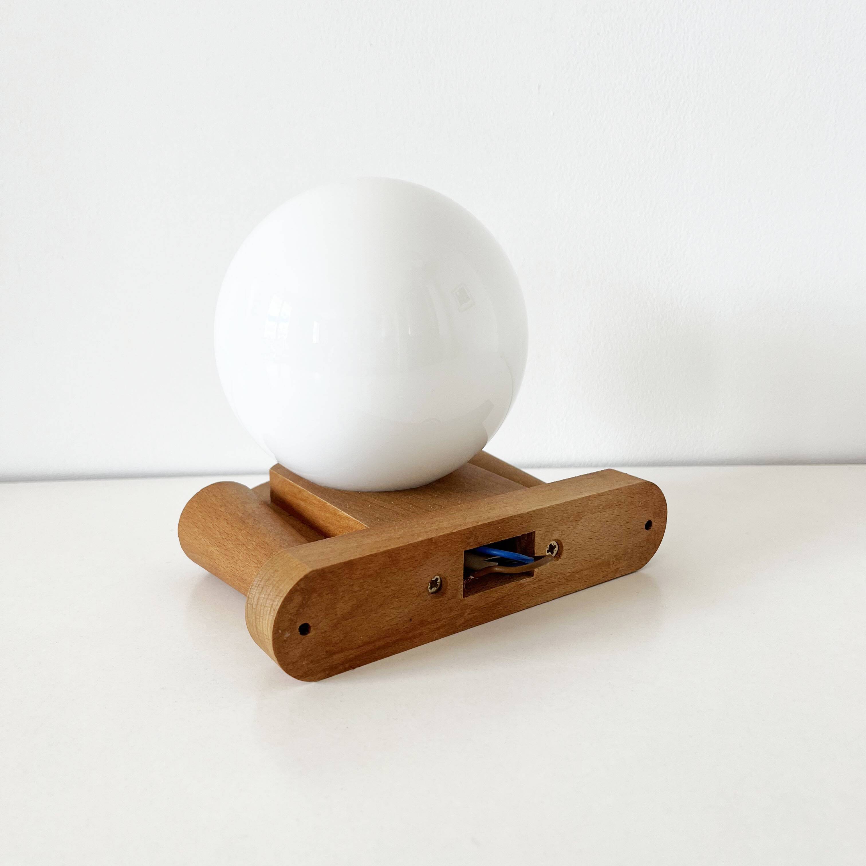 Tissot wall lamp in wood and opaline globe 1960