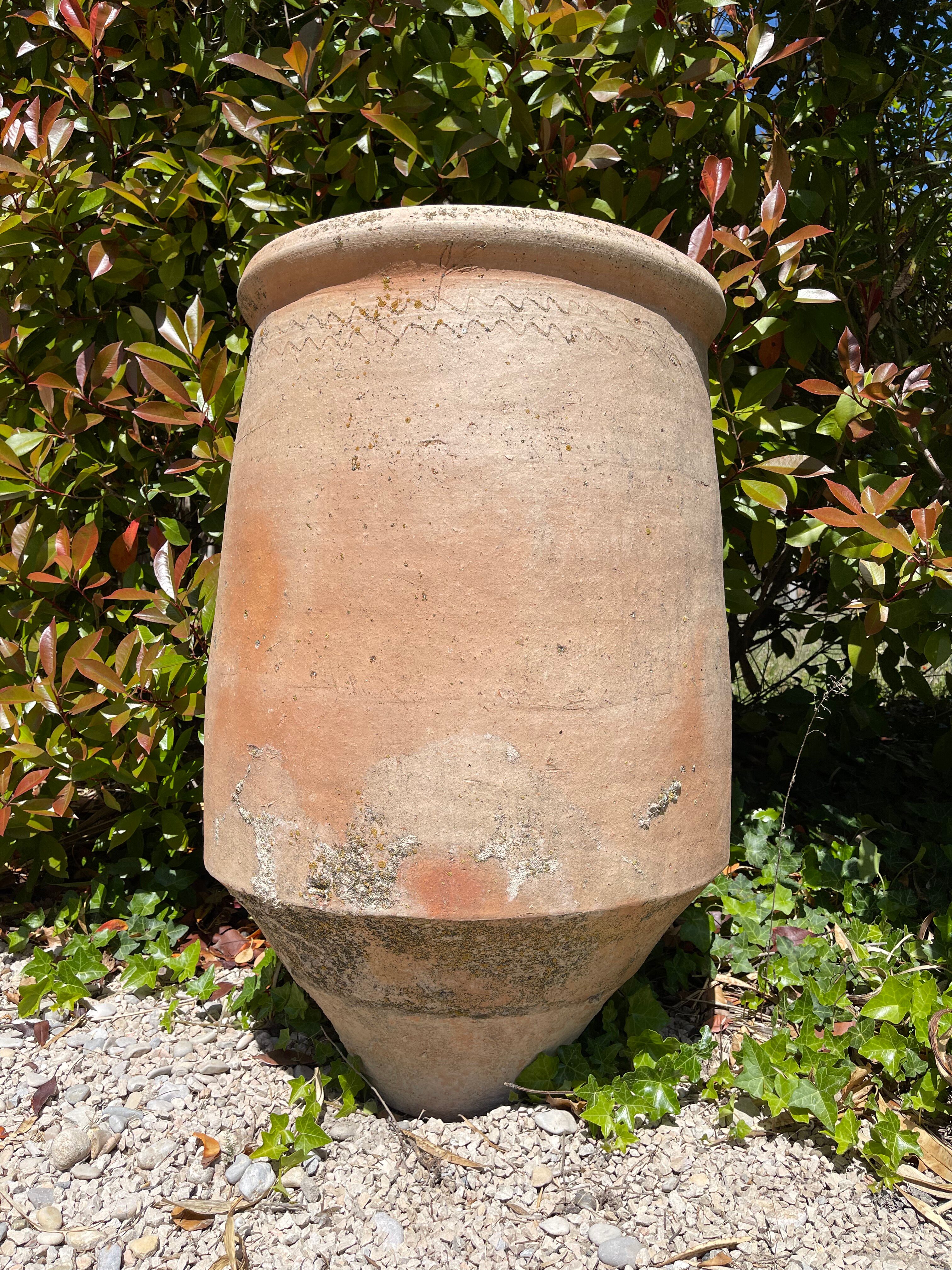 Ancient terracotta pottery jar