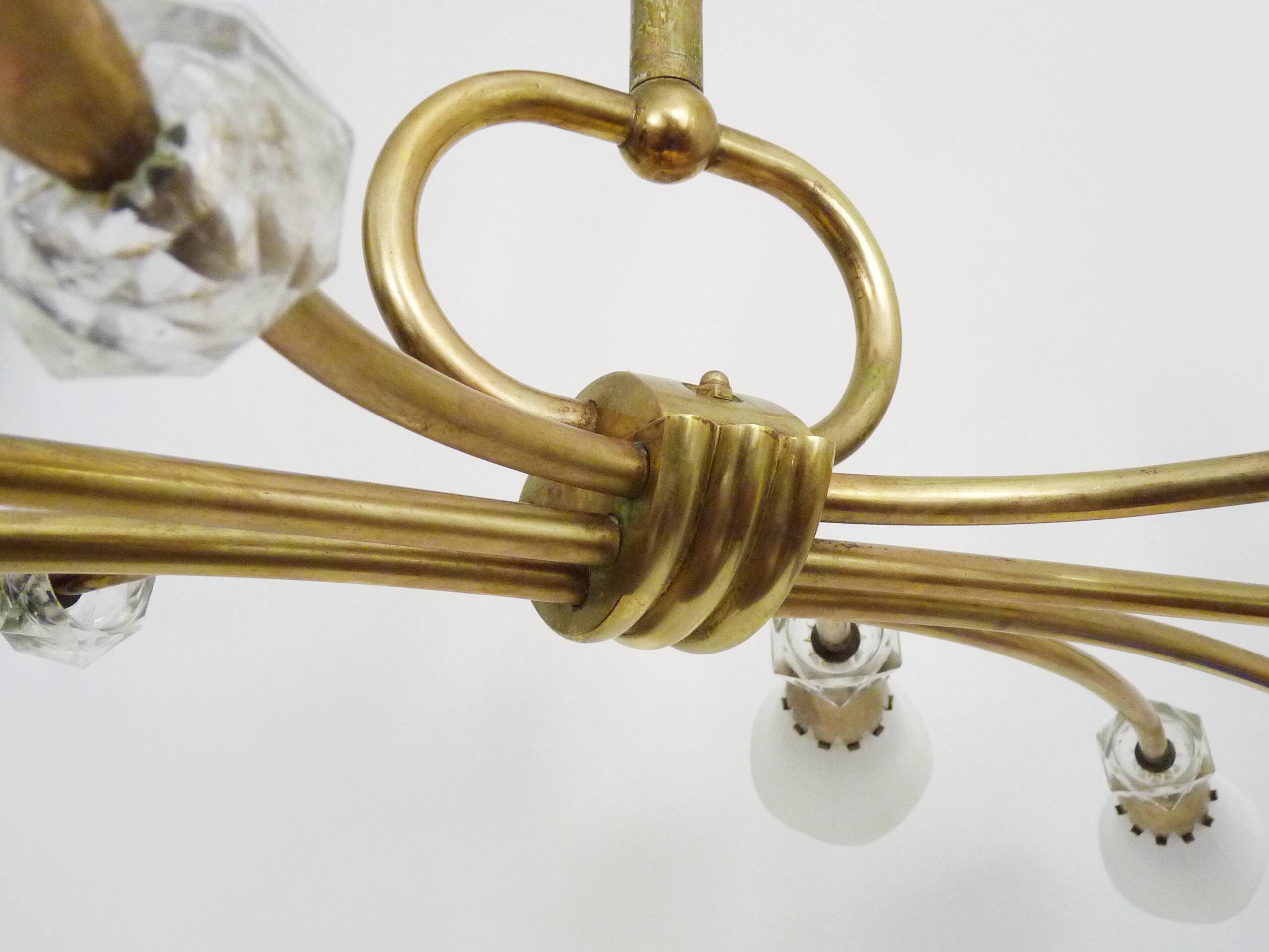 Modernist chandelier with 10 brass branches and white glass tubes, 1970s