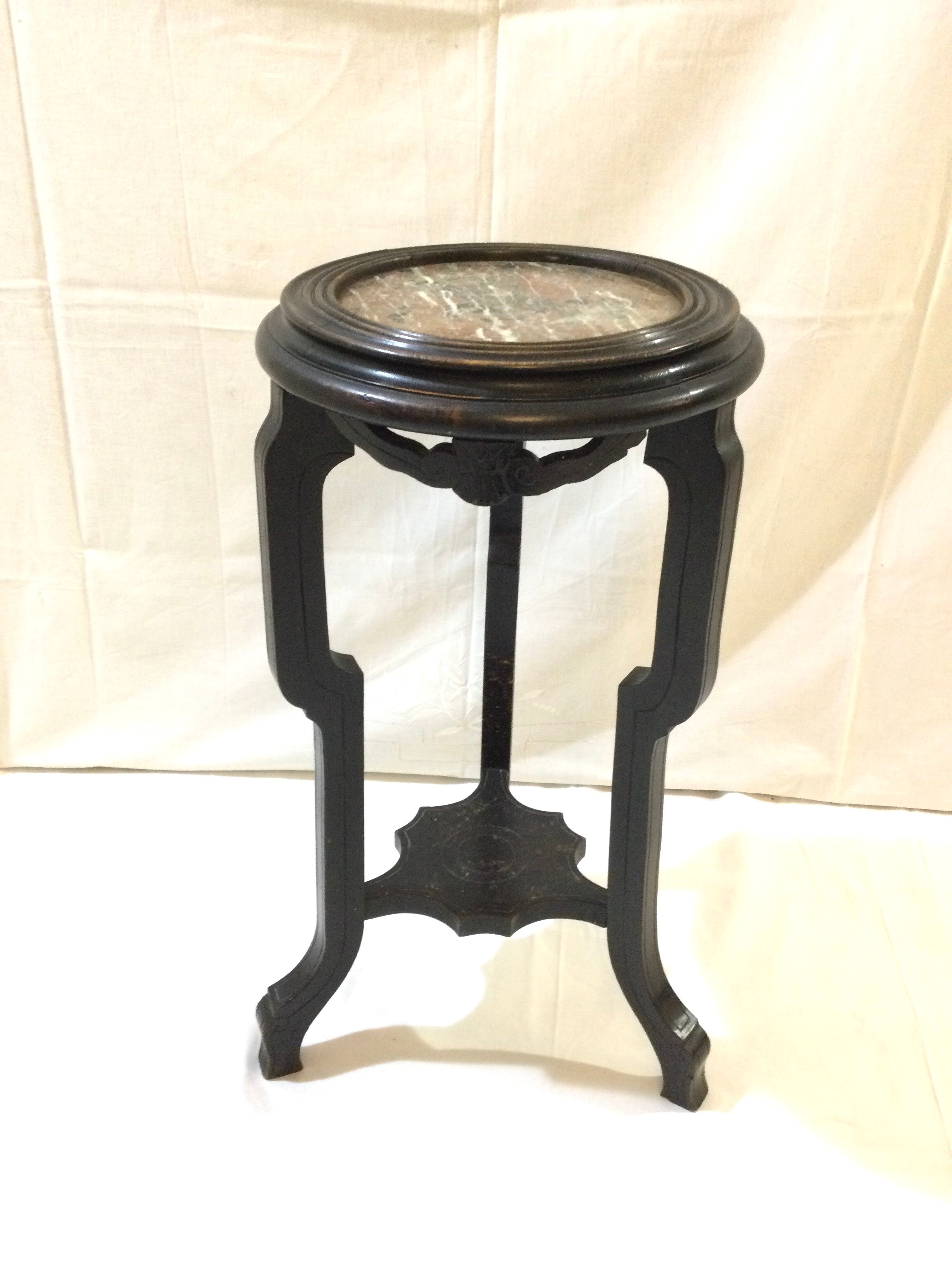 Blackened wooden and marble harness