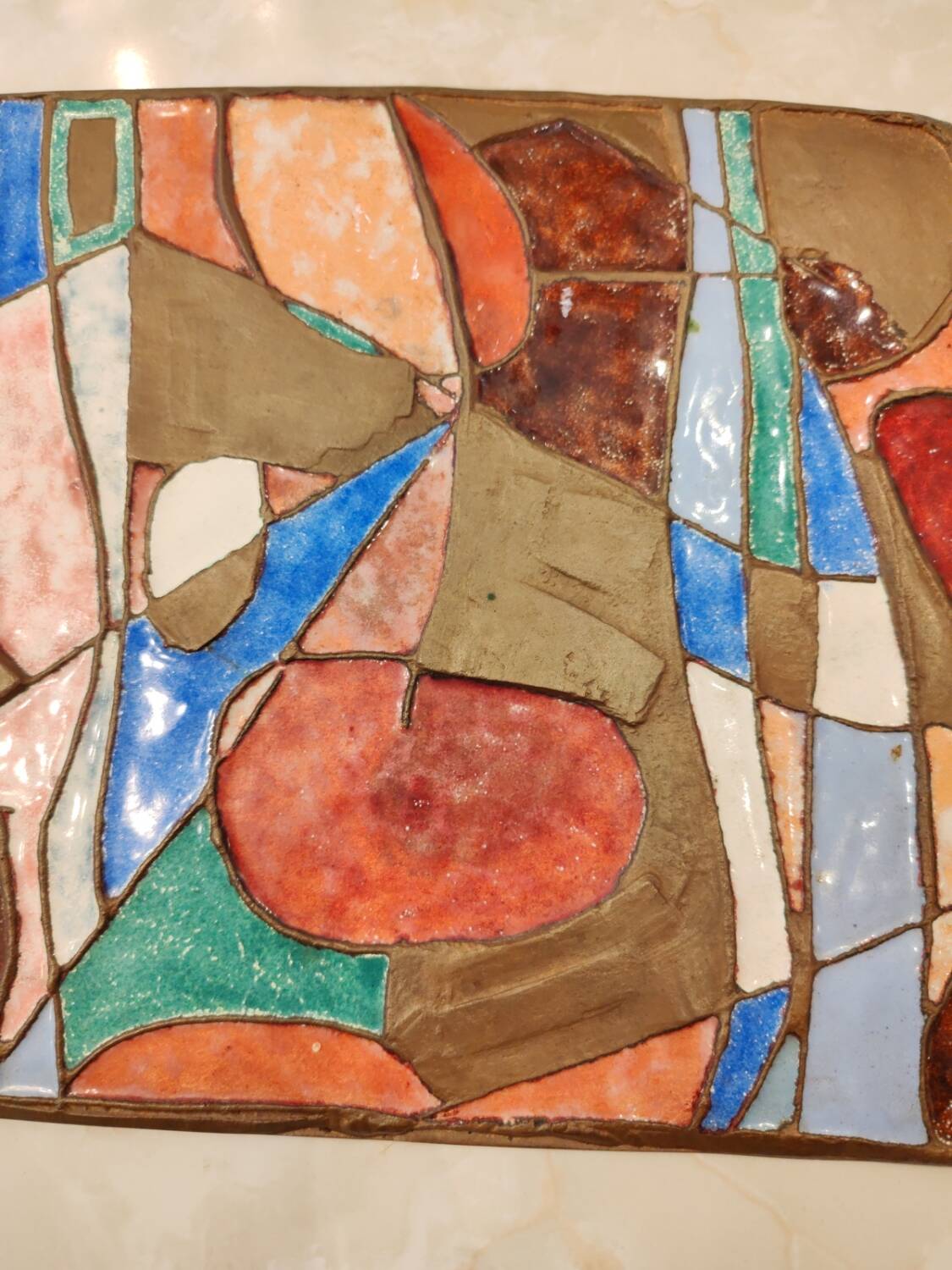 Isaac Lane Muse, brass and enamel plaque.