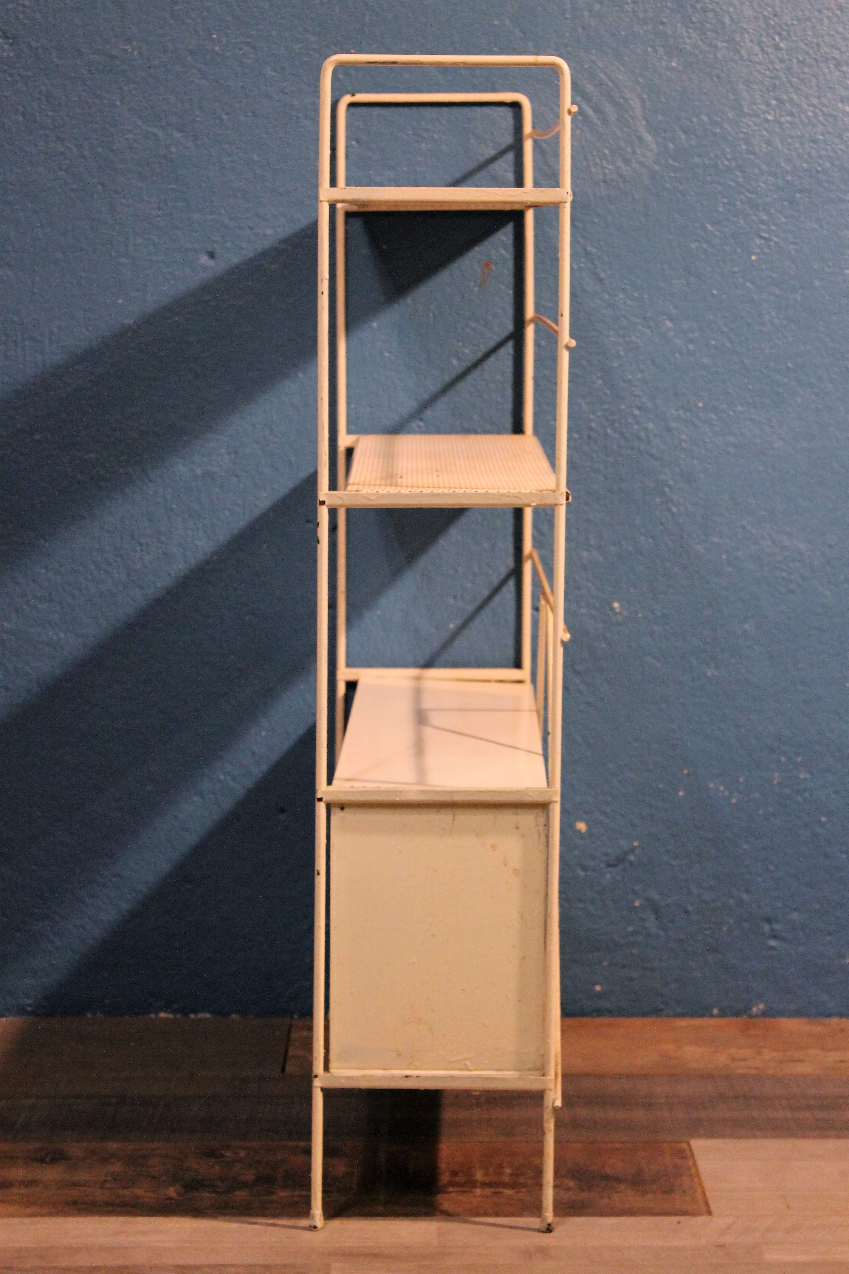 Perforated metal stand 1950