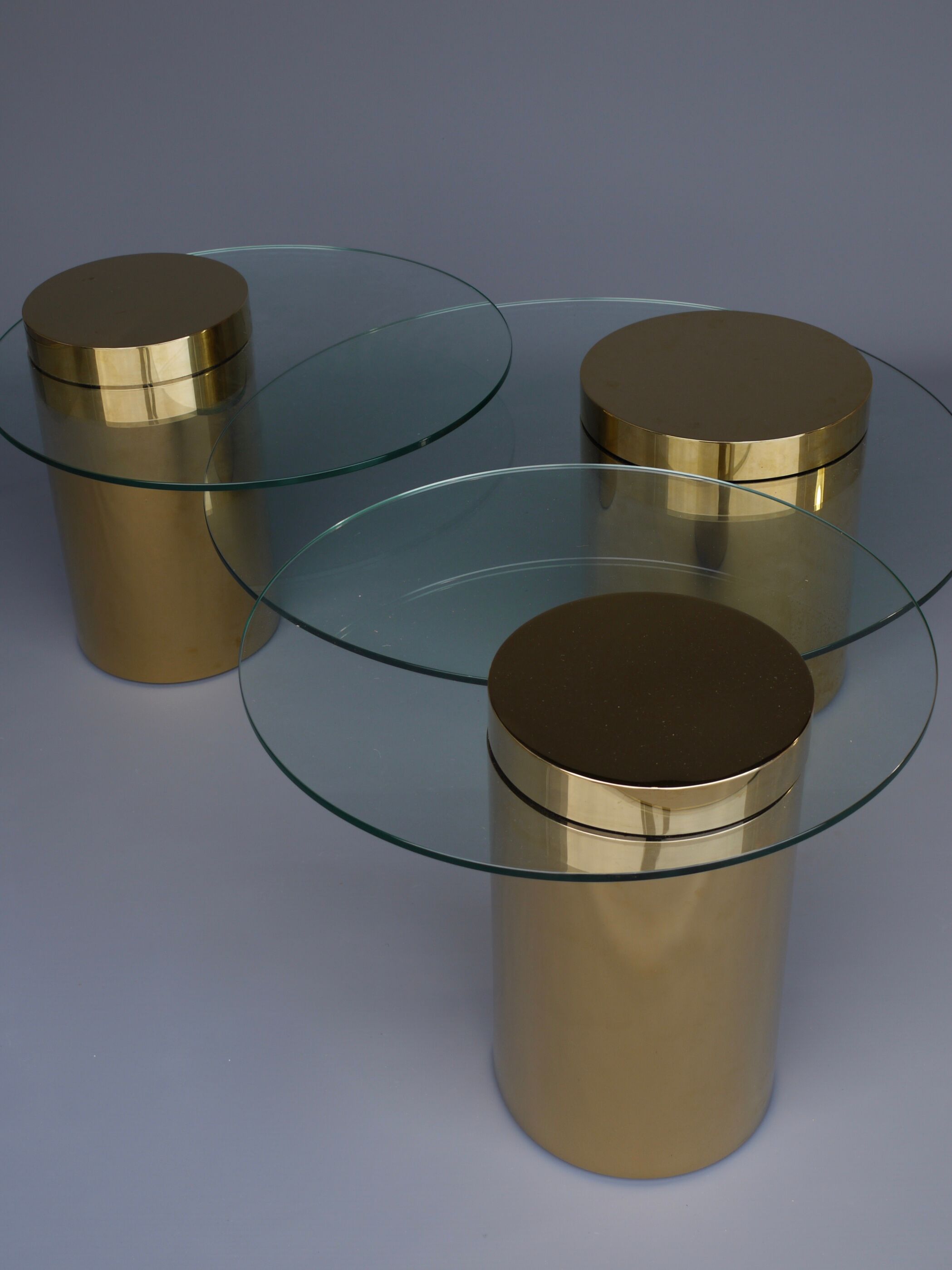 Polished Brass and Glass Low Tables. 2000s. Set of 3