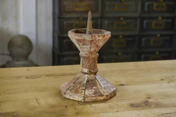 Pair of patinated cast iron candlesticks, 1940s
