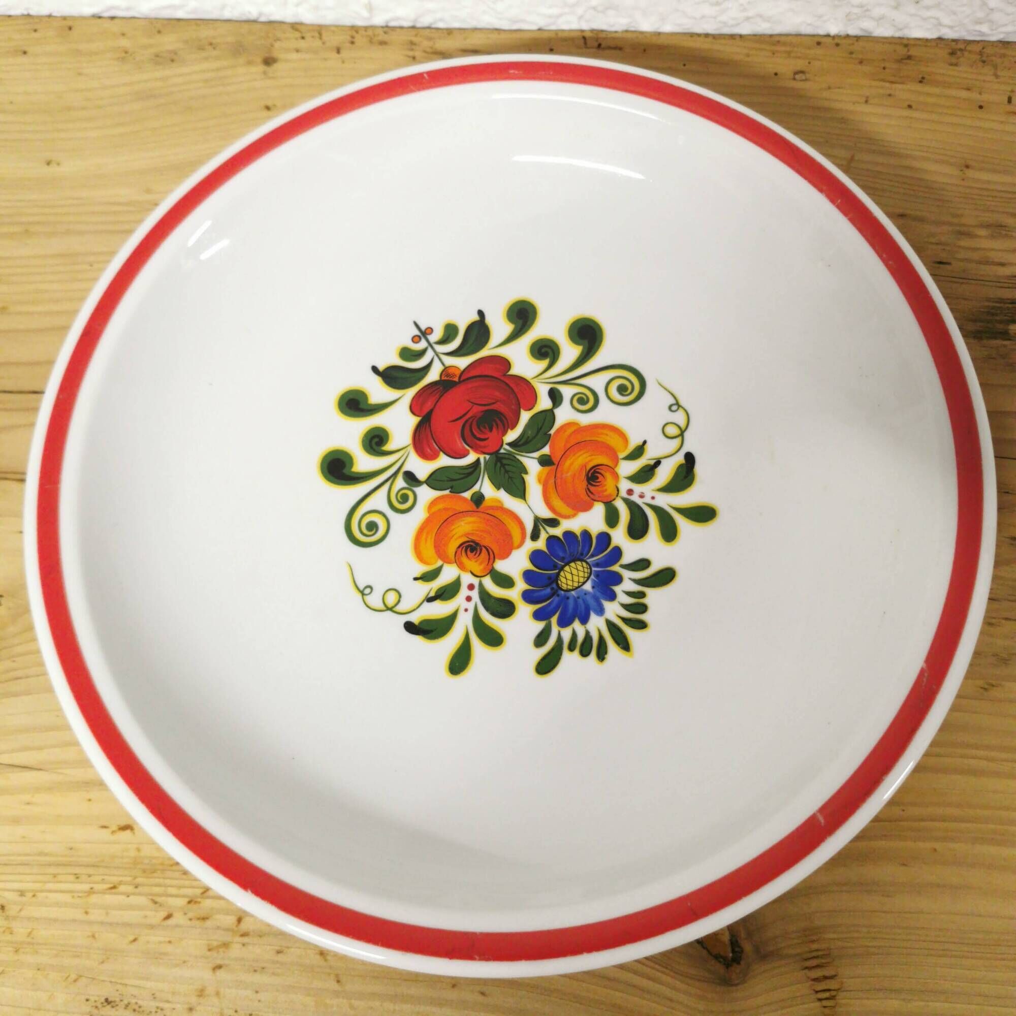 Shallow porcelain dish by Winterling with floral decoration.
