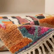 Moroccan handwoven wool rug in colour block peach, pink, teal, and orange, 122x183 cm.