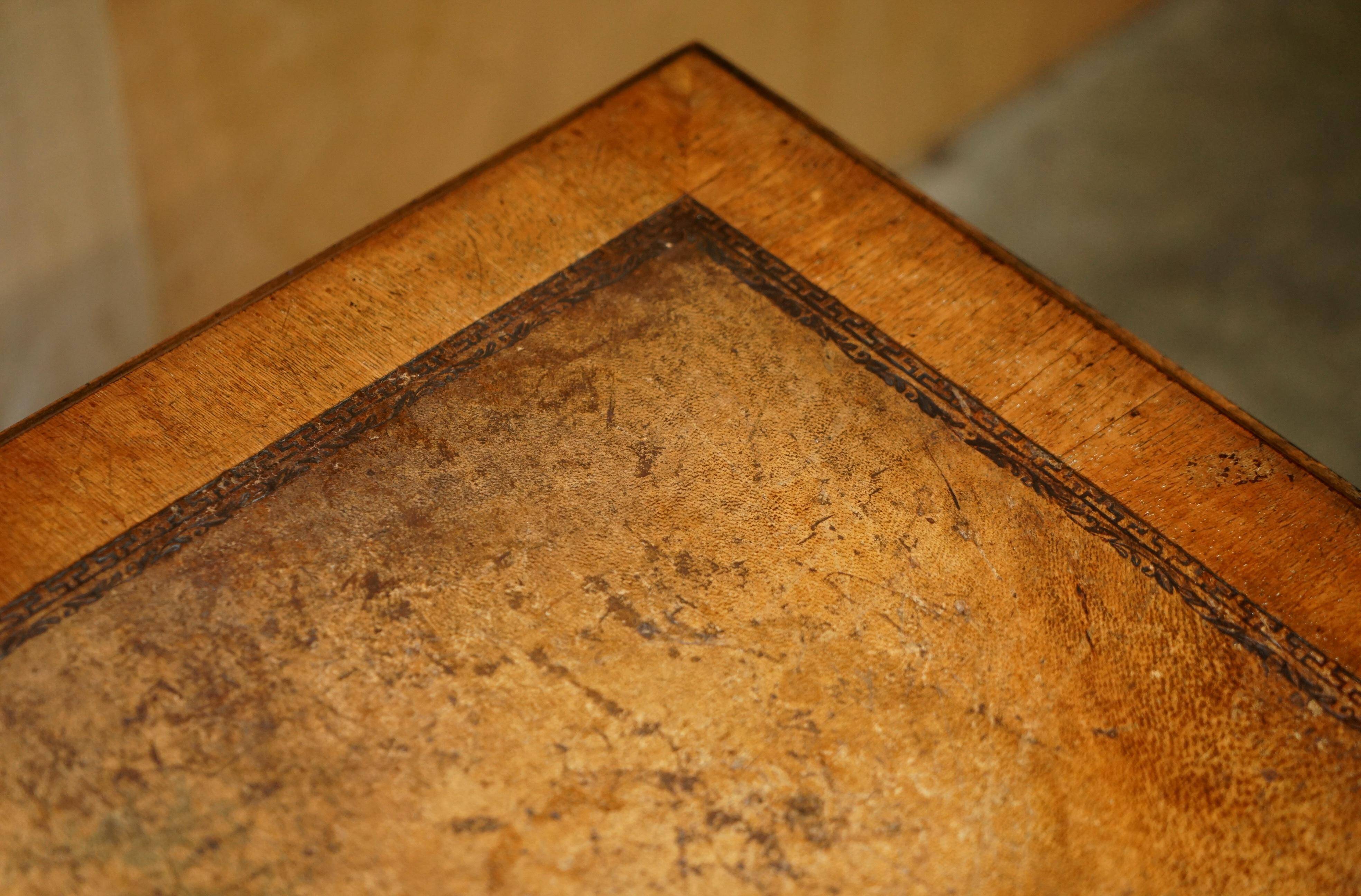 Victorian antique partner's desk in veined walnut with a leather top.