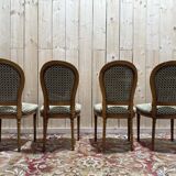 Suite de 4 chaises style Louis XVI "Fer à cheval"