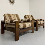 2 vintage 1970s wooden and fabric armchairs