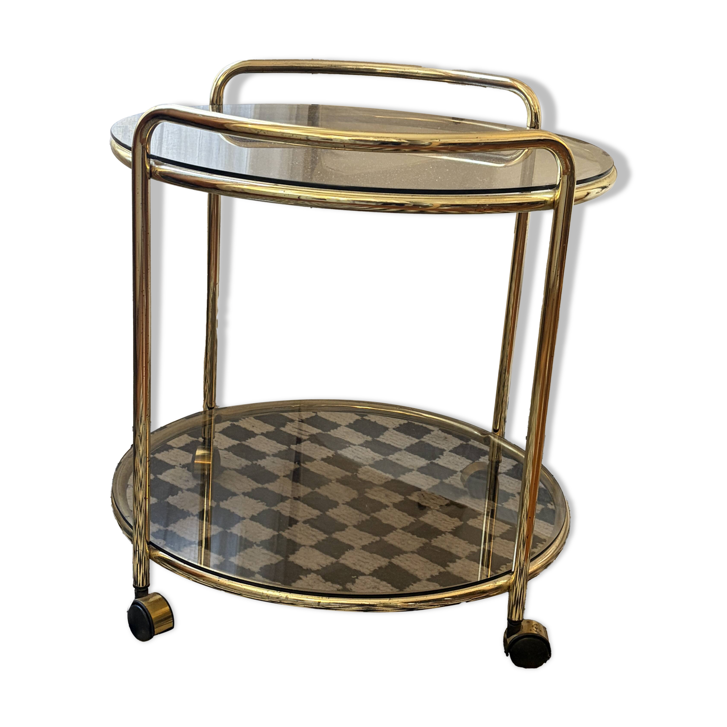 Vintage gold glass table on wheels